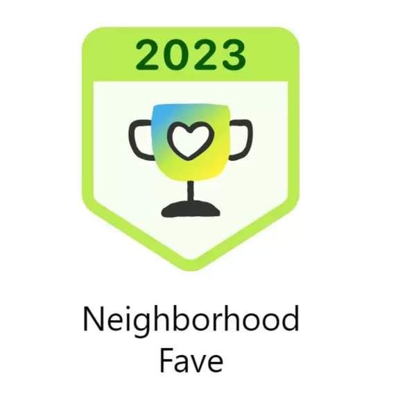 A green badge with a trophy and heart, labeled "2023 Neighborhood Fave".